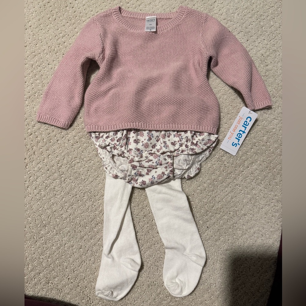 Carter's Light Pink Sweater with Floral bottoms and tights.